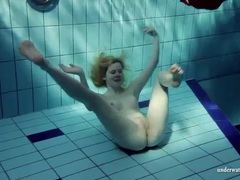 RefleXXX presents: Blonde goes for a swim and strips