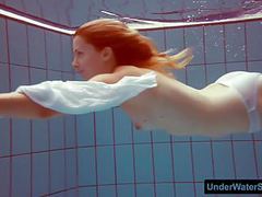 RefleXXX presents: Redhead in a white dress and sexy bikini
