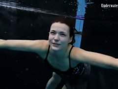 RefleXXX presents: Beautiful girl swims and smiles underwater