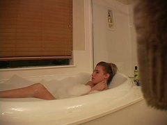 RefleXXX presents: Hidden camera captures girl masturbating in bathtub