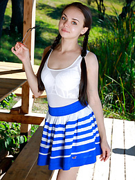 RefleXXX presents: Fresh-Faced russian beauty Mia Grandy gets totally naked on a picnic table in a garden